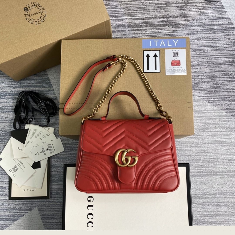 G*u*i top handle bags